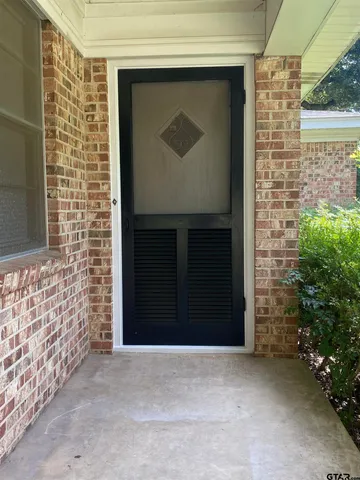 a front view of a house with a garage