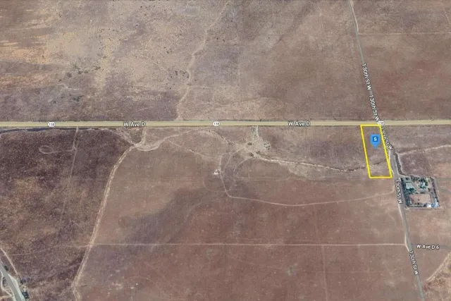 a view of beach and large space