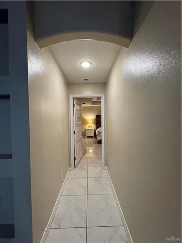 a bedroom with a bed and a cabinets