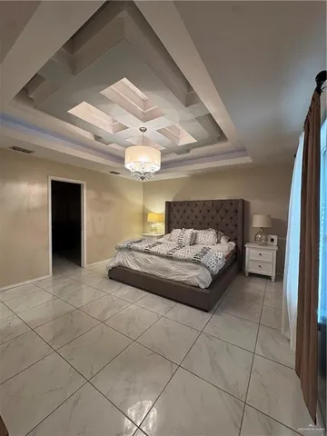a bathroom with a granite countertop sink a mirror and a vanity