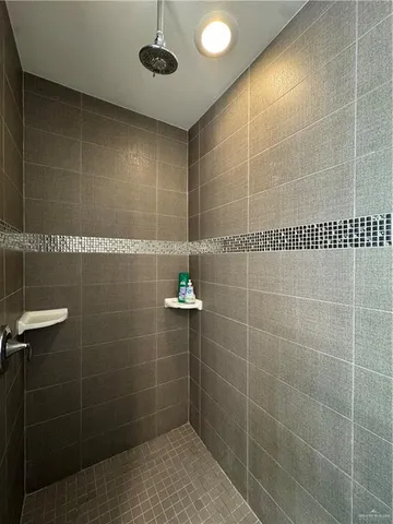 a bathroom with a toilet and a sink