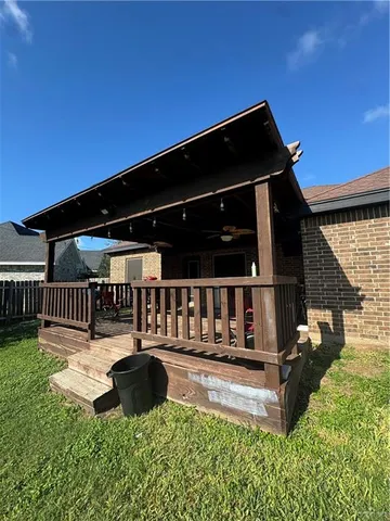 a view of a house with a big yard
