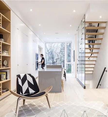 a view of a living room and entryway