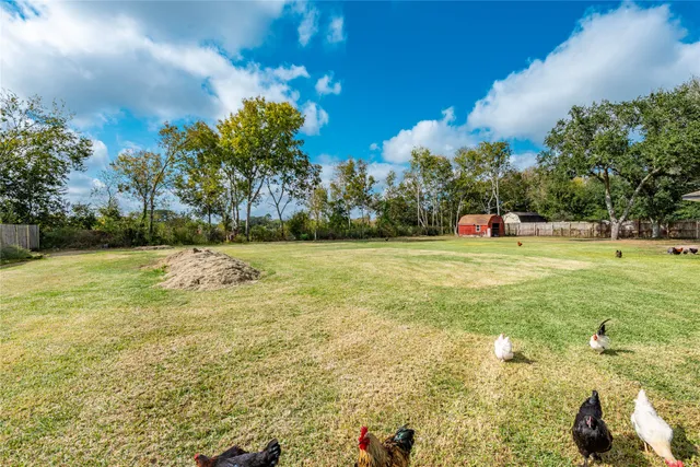 a view of swimming pool with an outdoor space and seating area