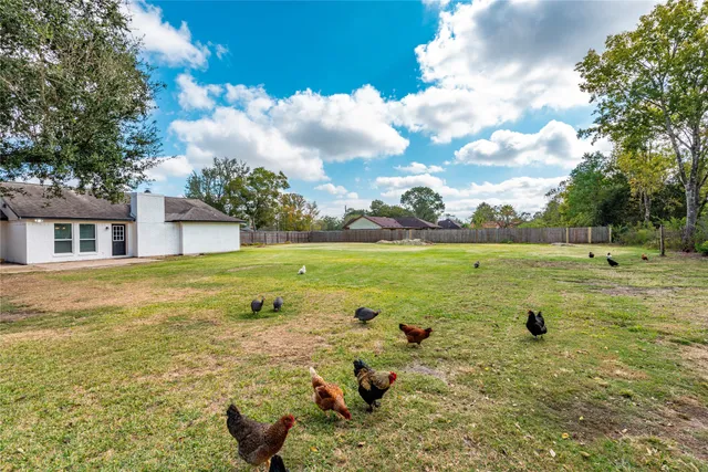 a view of a large body of water with a building in the background