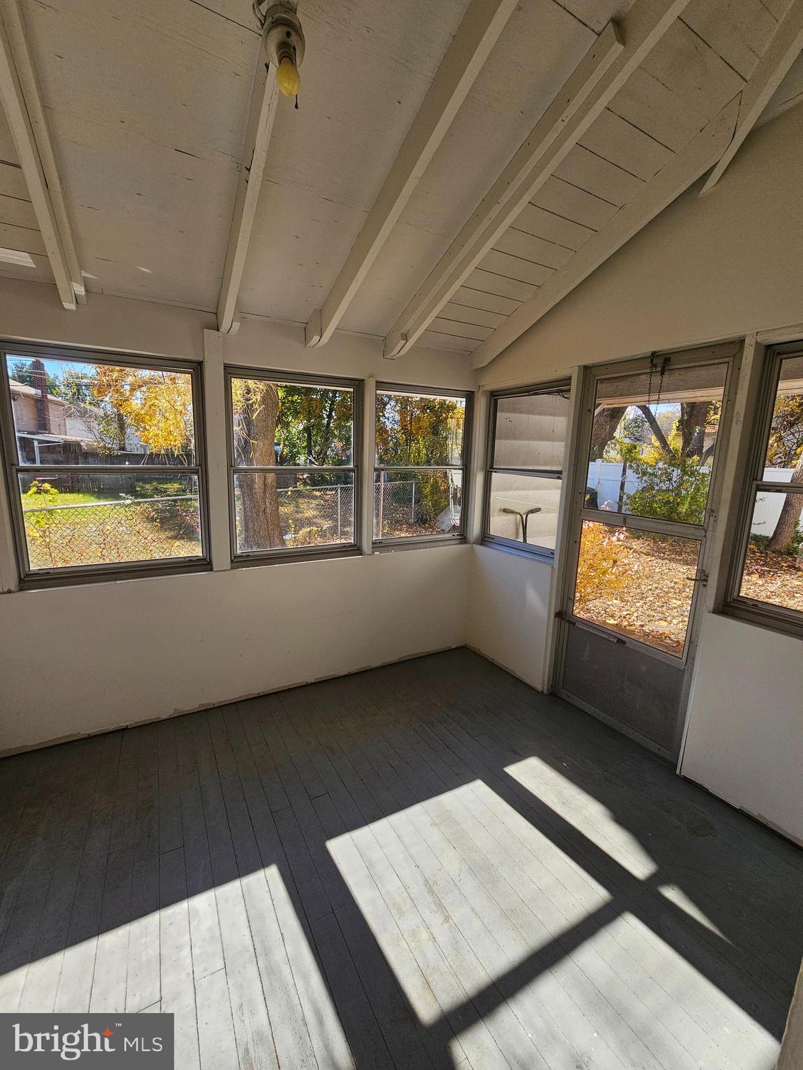 303 Delaware Circle, Unit 4 Newark, DE 19711 - Photo 13 of 14 a view of an empty room with a window
