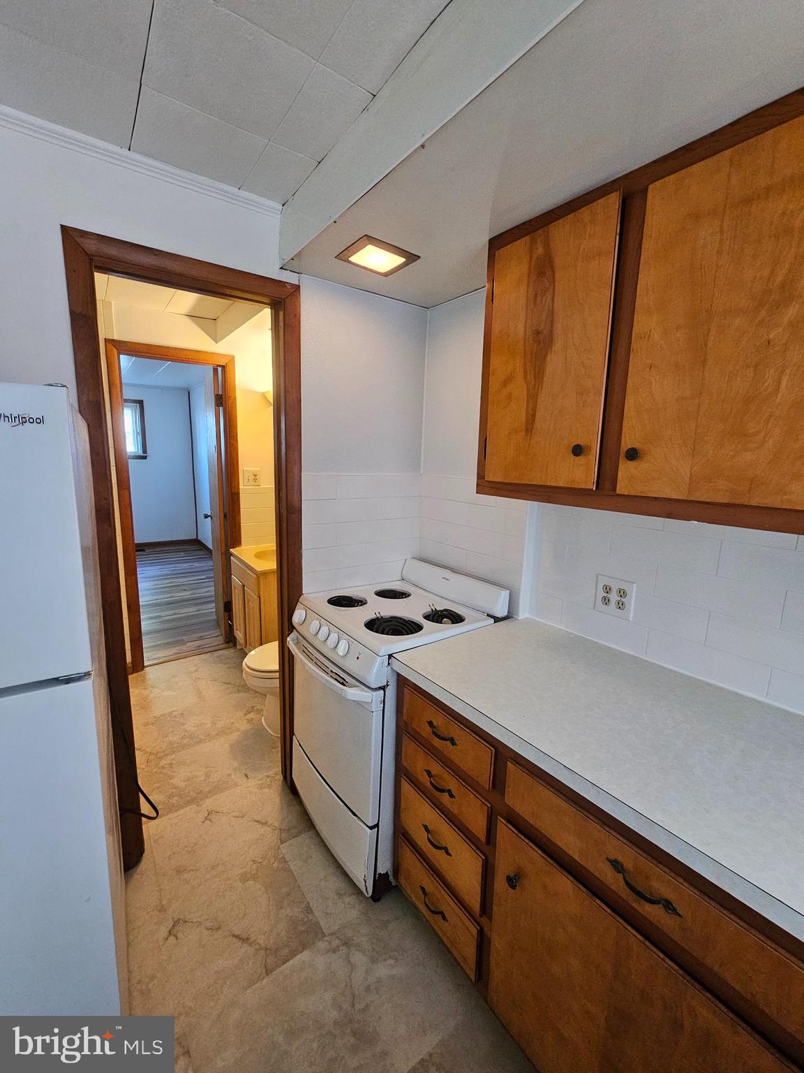 303 Delaware Circle, Unit 4 Newark, DE 19711 - Photo 6 of 14 a room with storage and utility