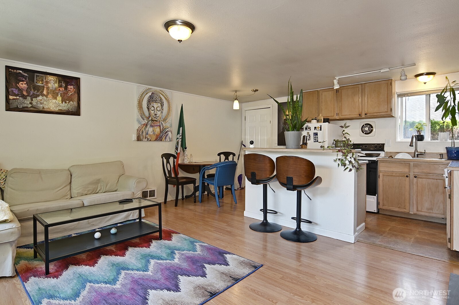 15002 4th Avenue South Burien, WA 98148 - Photo 16 of 30 a living room with furniture a wooden floor and next to a window