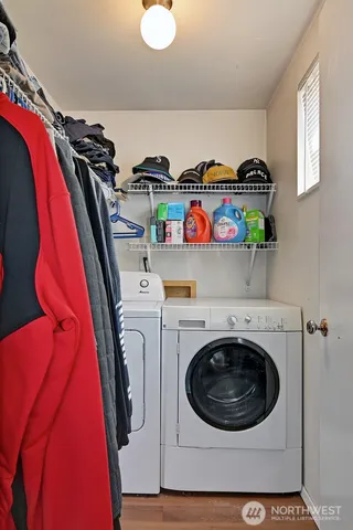 a utility room with dryer and washer