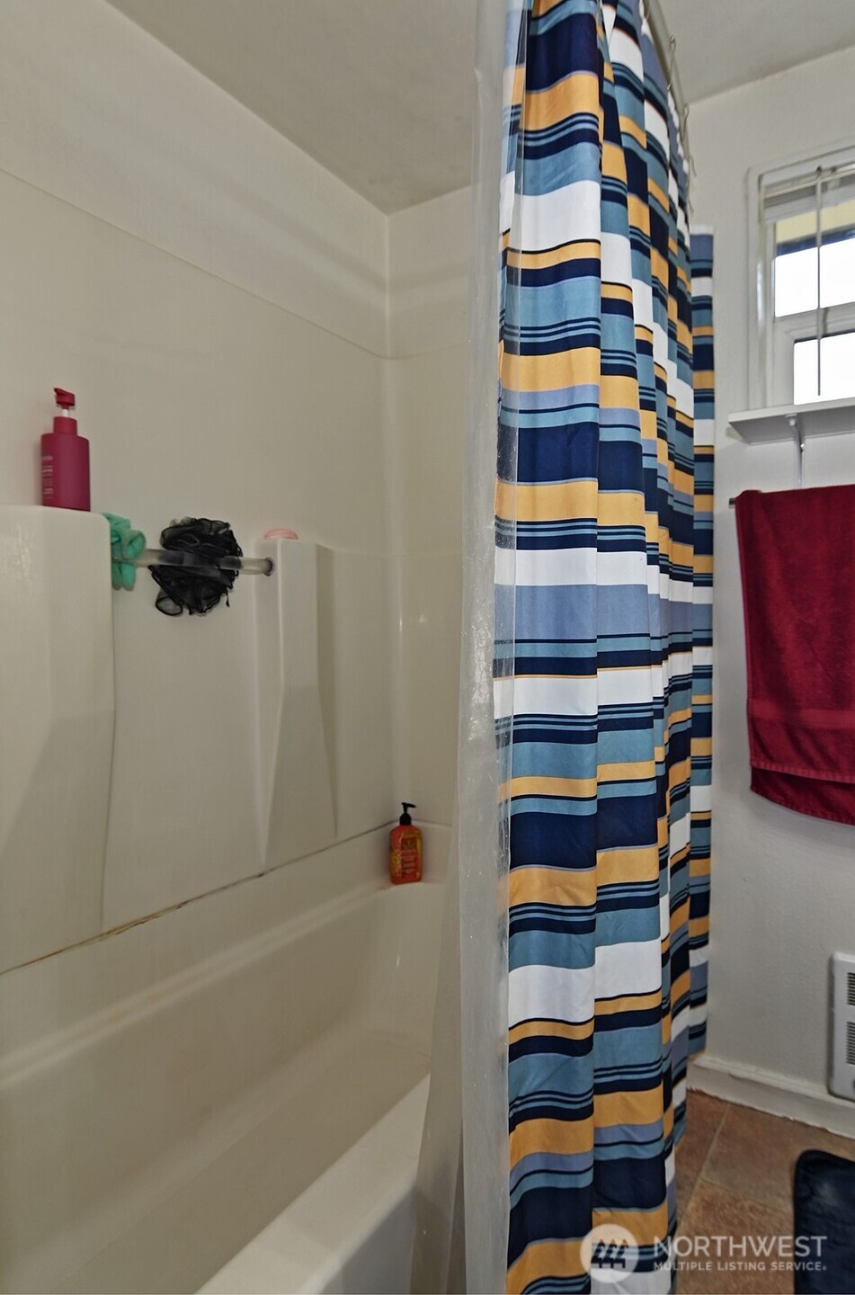 15002 4th Avenue South Burien, WA 98148 - Photo 25 of 30 a bathroom with a bathtub and a shower