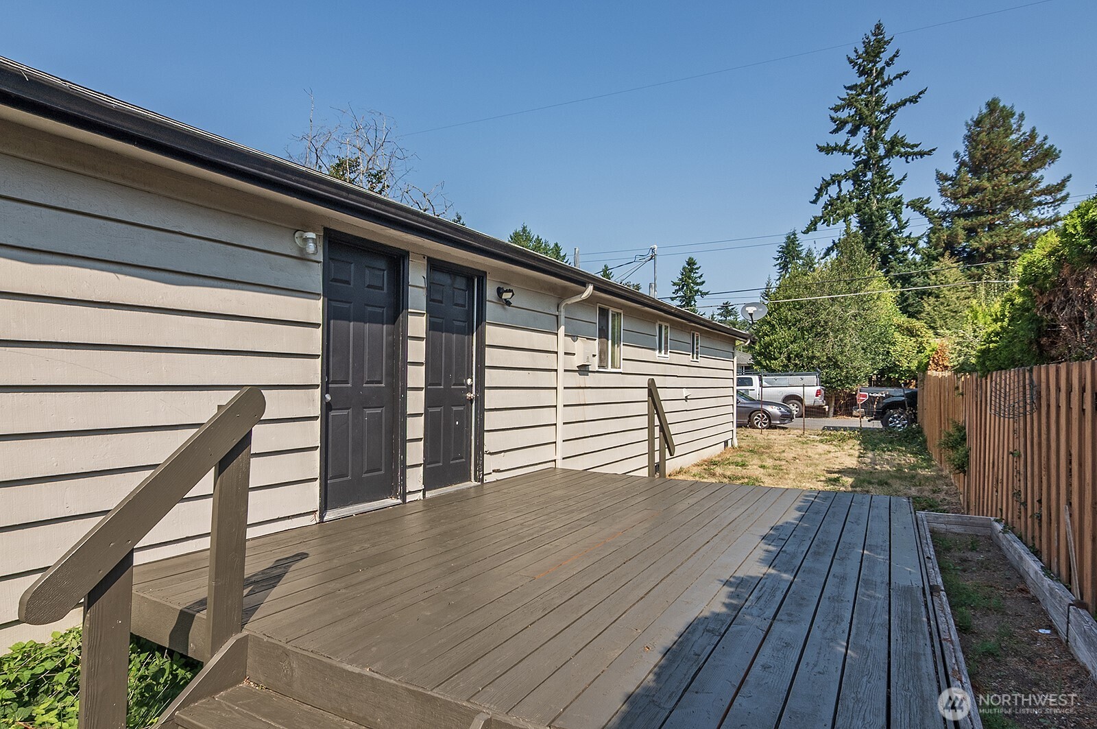 15002 4th Avenue South Burien, WA 98148 - Photo 27 of 30 a view of a deck with wooden floor and fence and a wooden floor