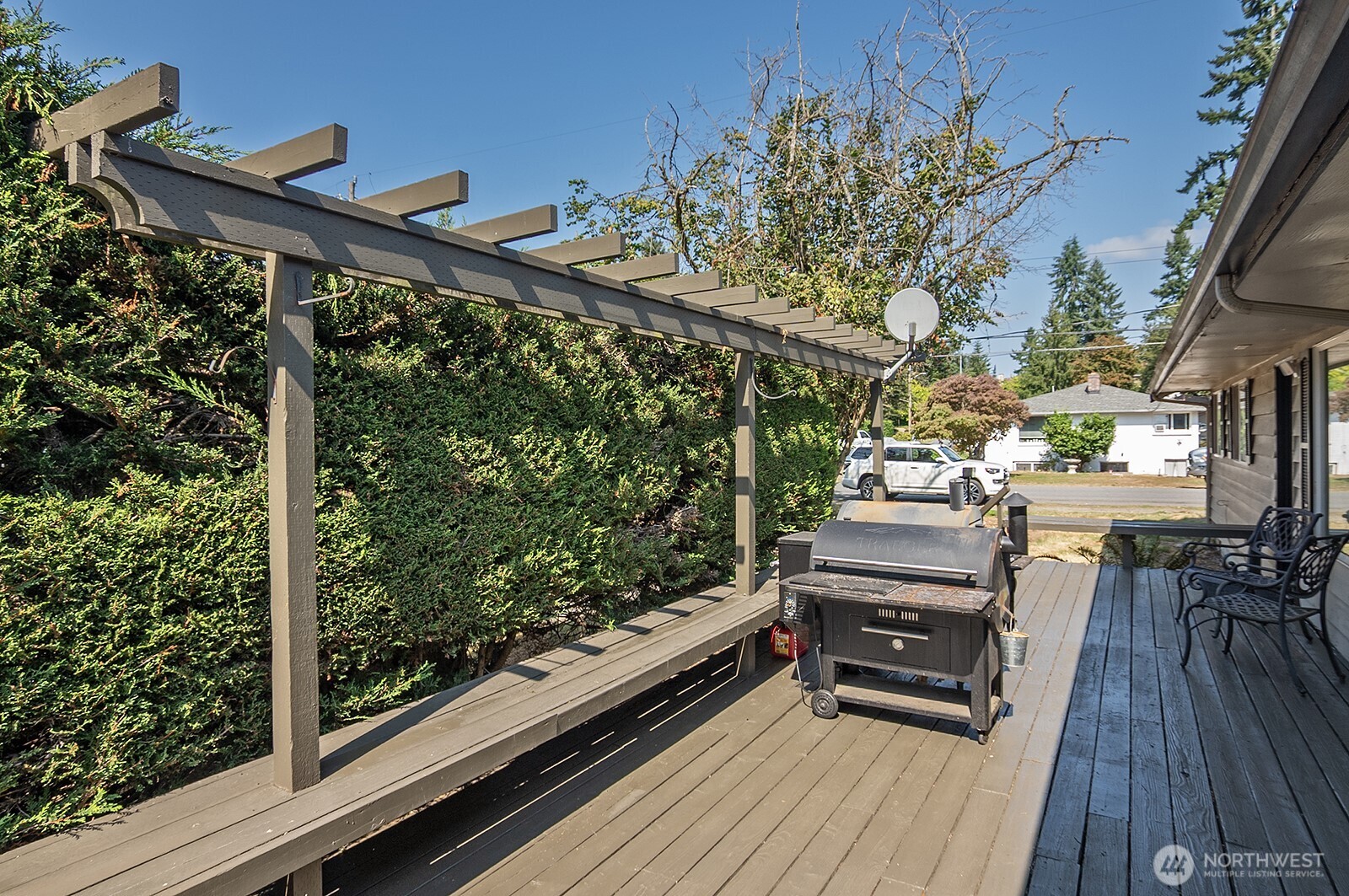 15002 4th Avenue South Burien, WA 98148 - Photo 3 of 30 a view of balcony with chairs and wooden floor