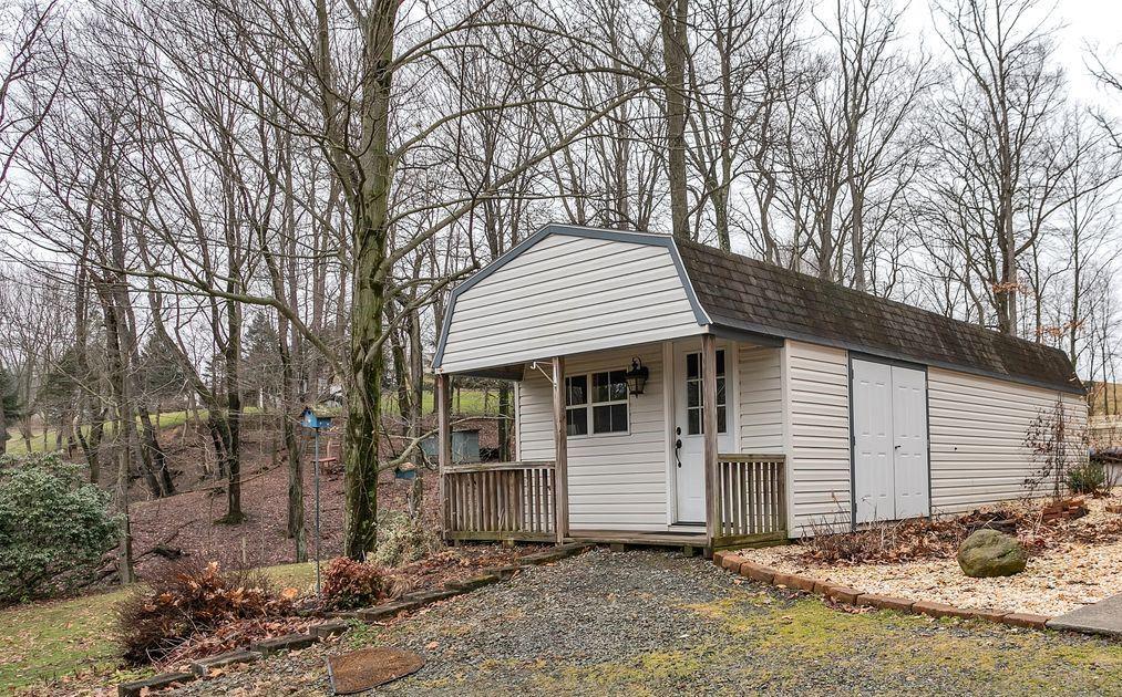 173 Harvey Road Sarver, PA 16055 - Photo 2 of 25 a view of a house with a yard