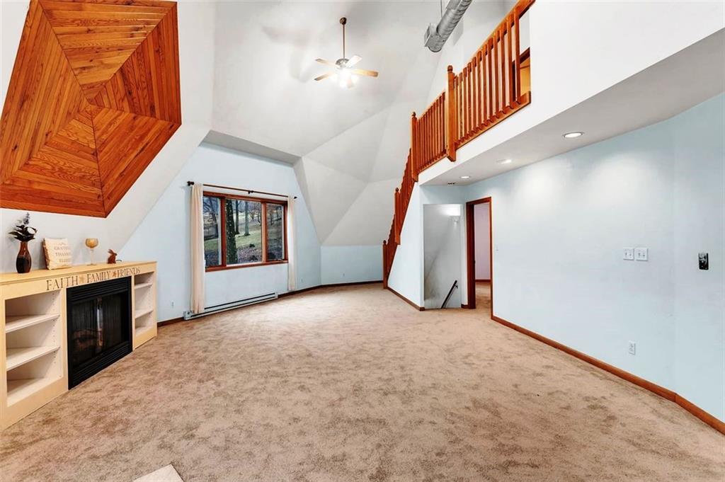 173 Harvey Road Sarver, PA 16055 - Photo 3 of 25 a view of an empty room with fireplace and a window