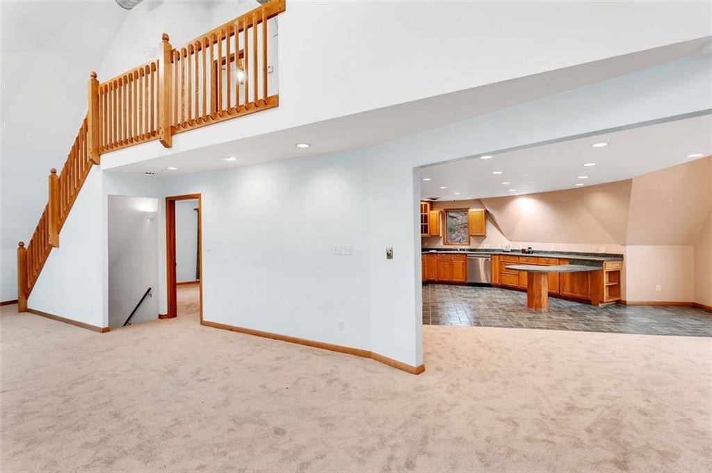 173 Harvey Road Sarver, PA 16055 - Photo 6 of 25 an empty room with wooden floor and windows