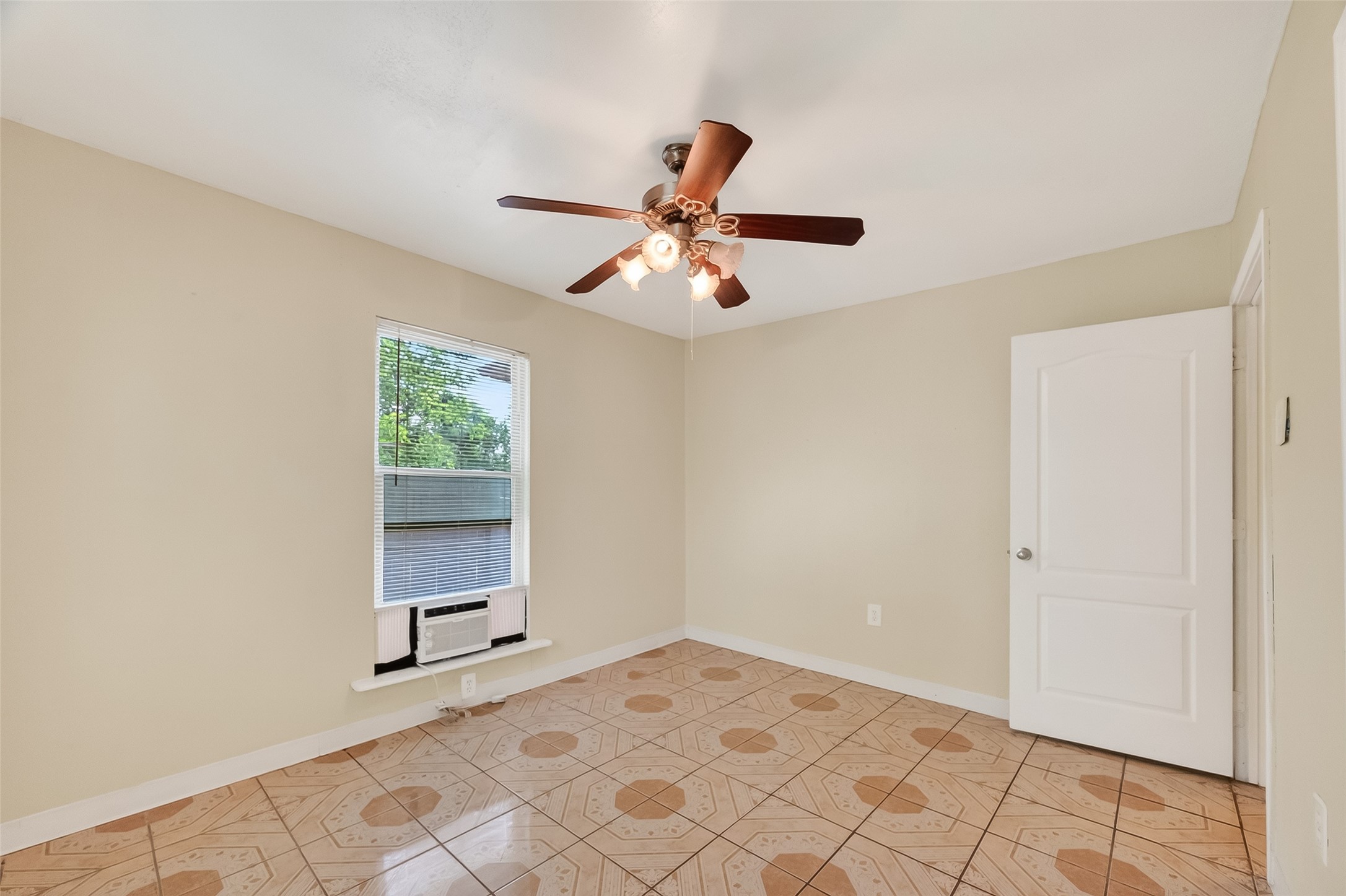 968 Garapan Street Houston, TX 77091 - Photo 27 of 40 a view of an empty room and window