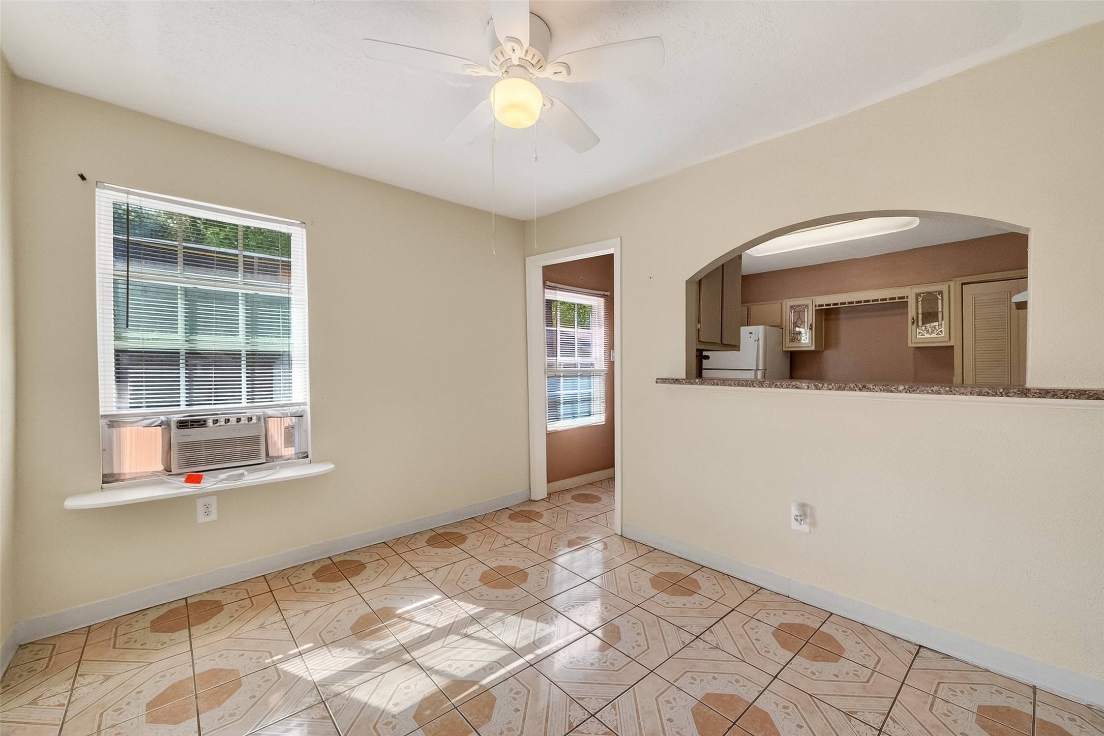 968 Garapan Street Houston, TX 77091 - Photo 9 of 40 a view of a room with wooden floor and cabinet