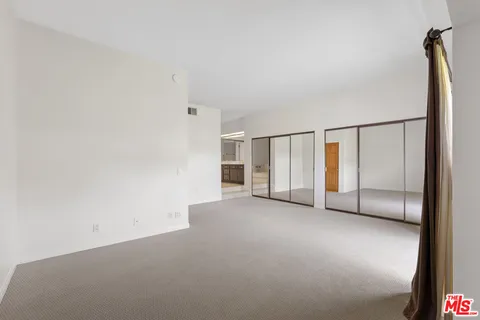 a view of a livingroom with a staircase