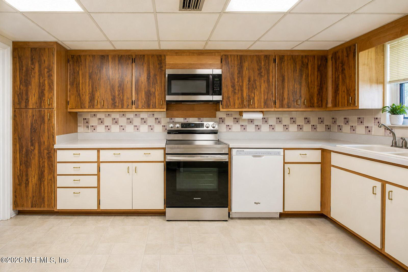 7711 Altama Road Jacksonville, FL 32216 - Photo 7 of 18 7711_KitchenWide2