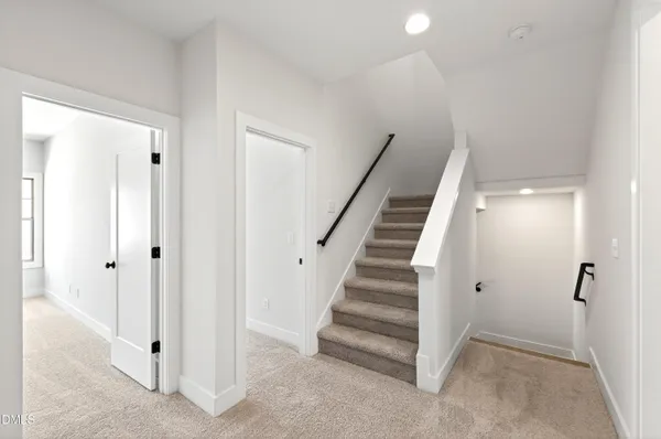 a view of entryway with white walls
