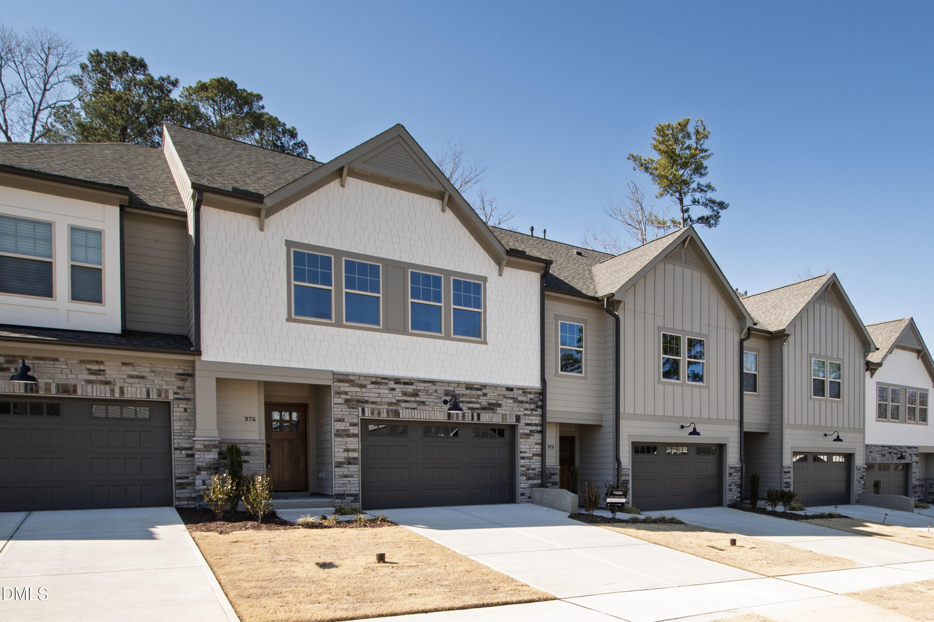 976 Double Helix Road Apex, NC 27523 - Photo 49 of 50 a front view of a house with a garden