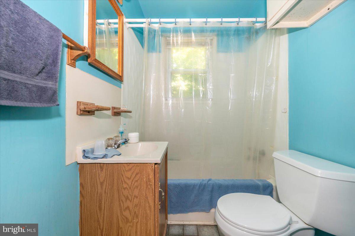 6109 Ford Road Frederick, MD 21702 - Photo 32 of 59 a bathroom with a sink toilet and shower