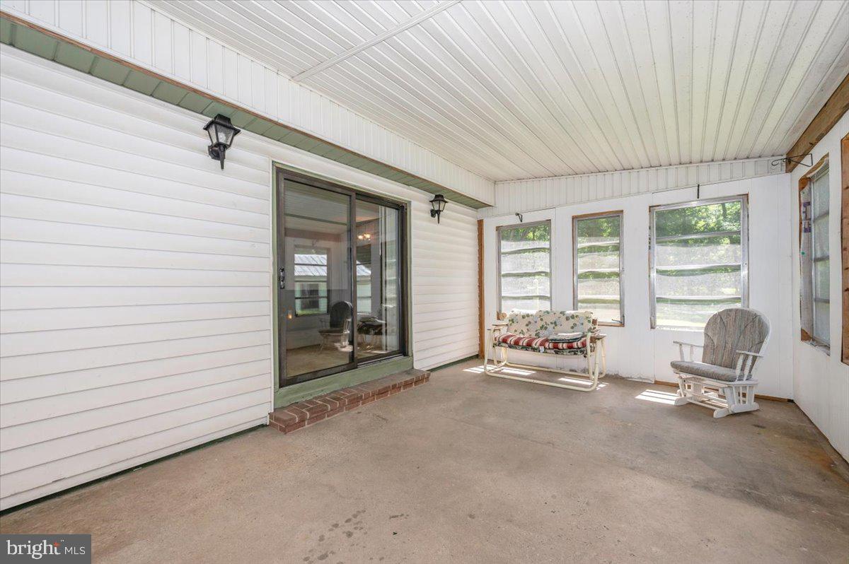 6109 Ford Road Frederick, MD 21702 - Photo 34 of 59 a room with furniture and large windows