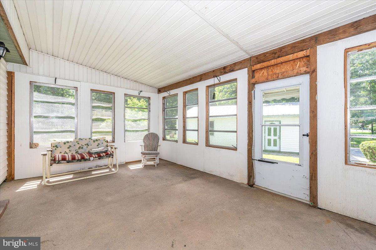 6109 Ford Road Frederick, MD 21702 - Photo 35 of 59 a living room with furniture and large windows