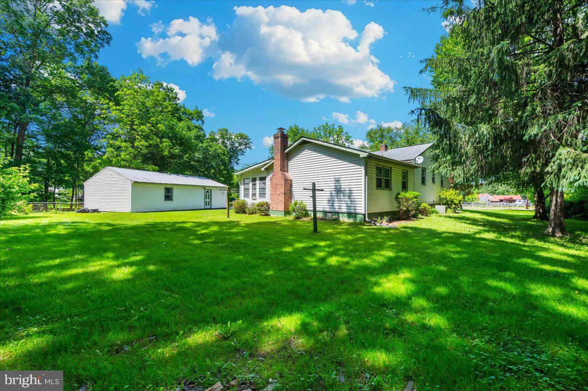 6109 Ford Road Frederick, MD 21702 - Photo 39 of 59 a front view of house with yard and green space