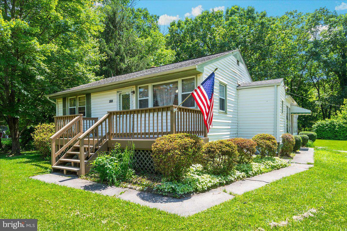 6109 Ford Road Frederick, MD 21702 - Photo 57 of 59 a view of a house with a yard and sitting area