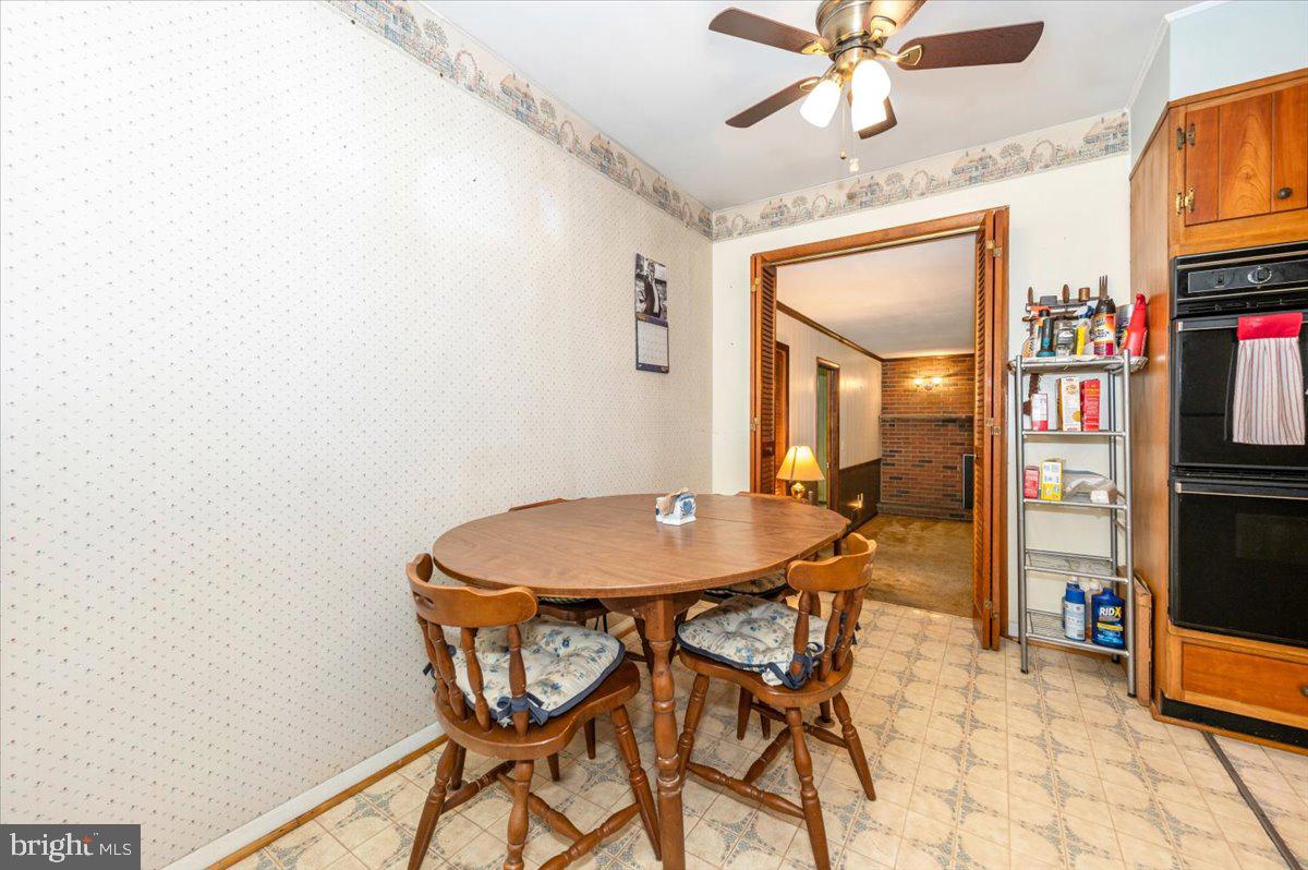 6109 Ford Road Frederick, MD 21702 - Photo 9 of 59 a dining room with furniture and window
