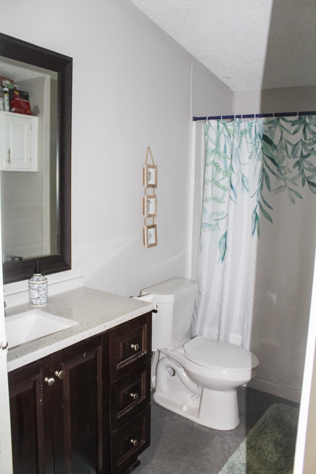8021 Matthew Steven Drive Conroe, TX 77306 - Photo 16 of 24 a bathroom with a sink a toilet and a mirror