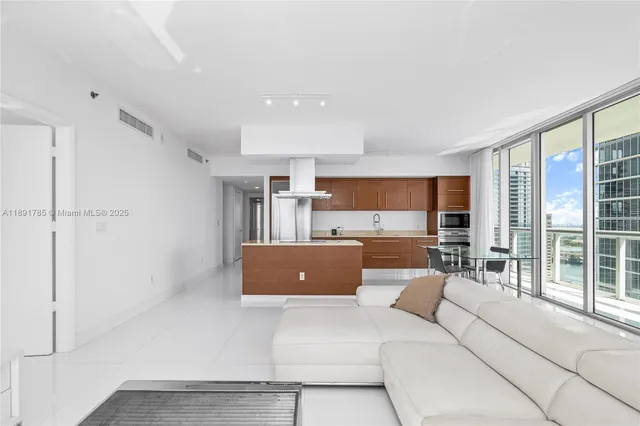 a view of a room with a balcony and chair