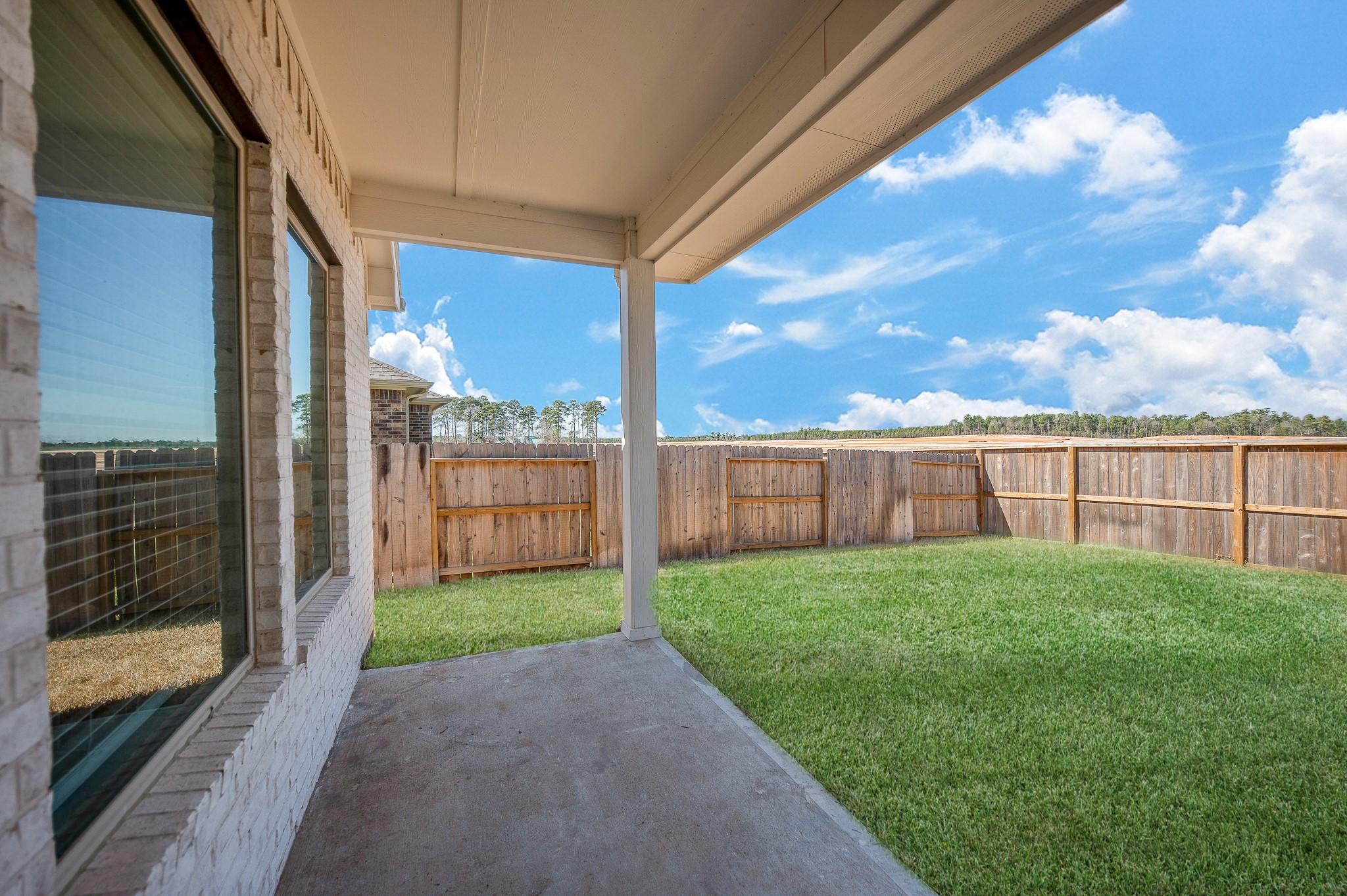 42514 Summer Crst Road Magnolia, TX 77354 - Photo 46 of 50 a view of a porch with a yard