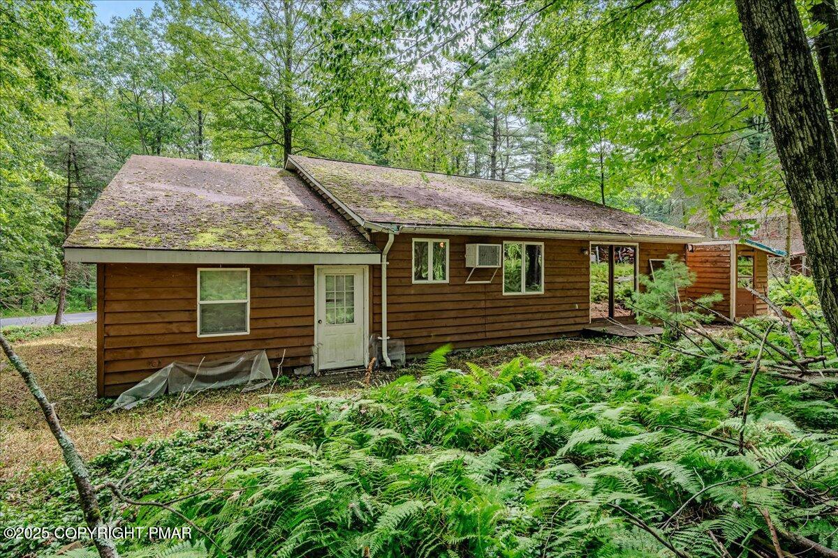115 Dirk Road Tafton, PA 18464 - Photo 22 of 24 a backyard of a house with lots of green space