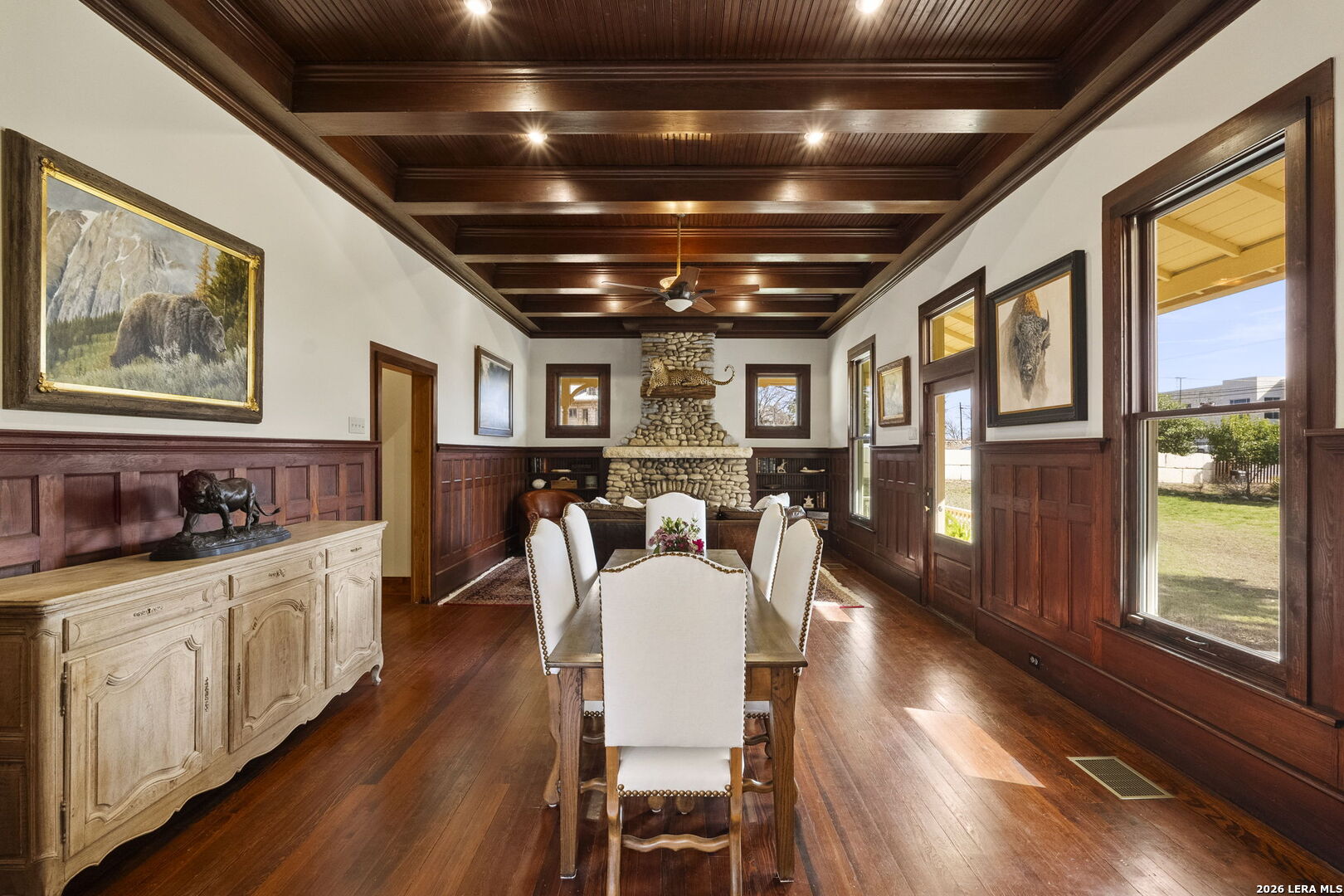 107 High Street Comfort, TX 78013 - Photo 11 of 47 a very nice looking dining room with wooden floor and large windows