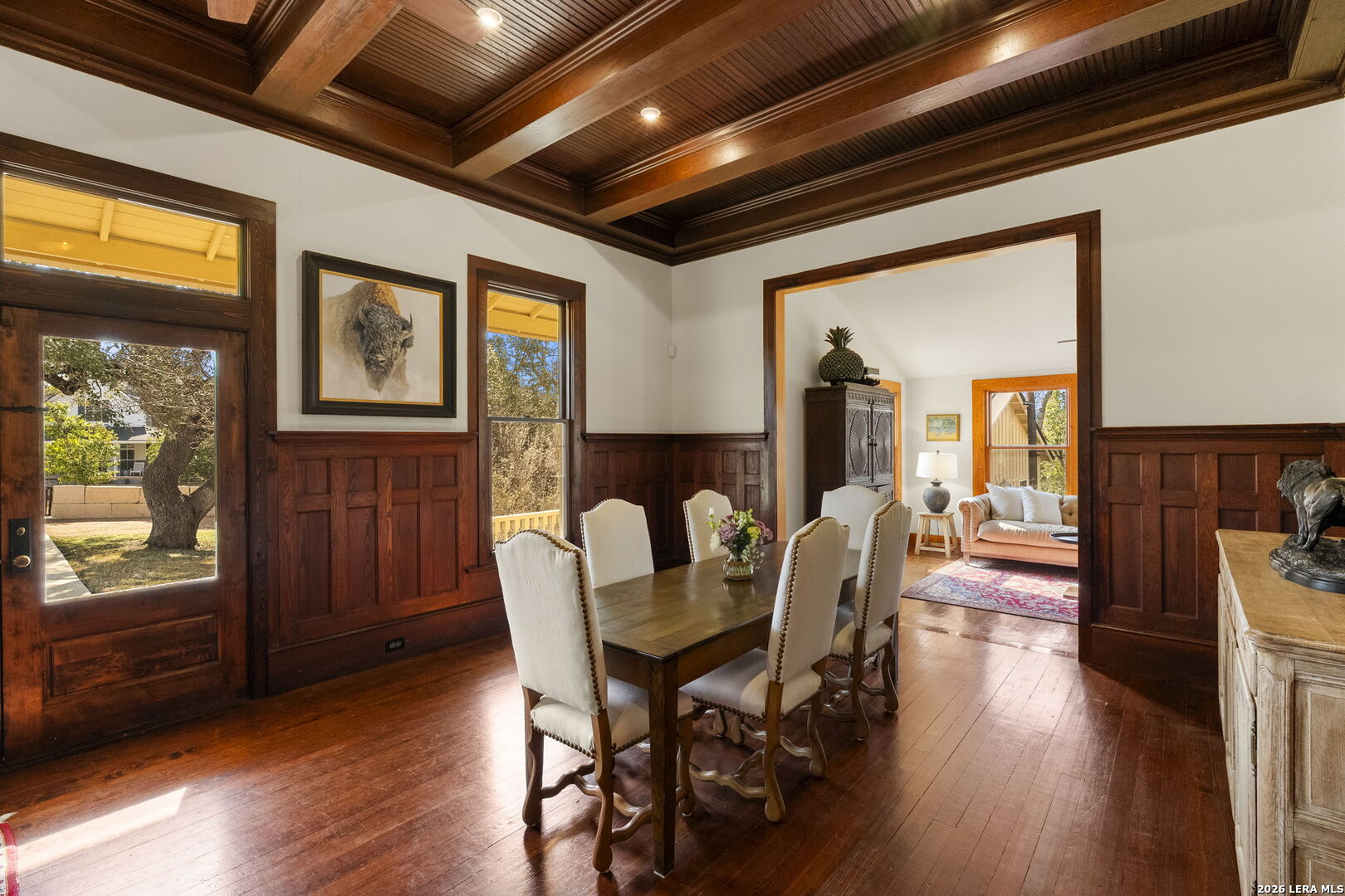 107 High Street Comfort, TX 78013 - Photo 13 of 47 a dining room with furniture wooden floor a glass table and chairs