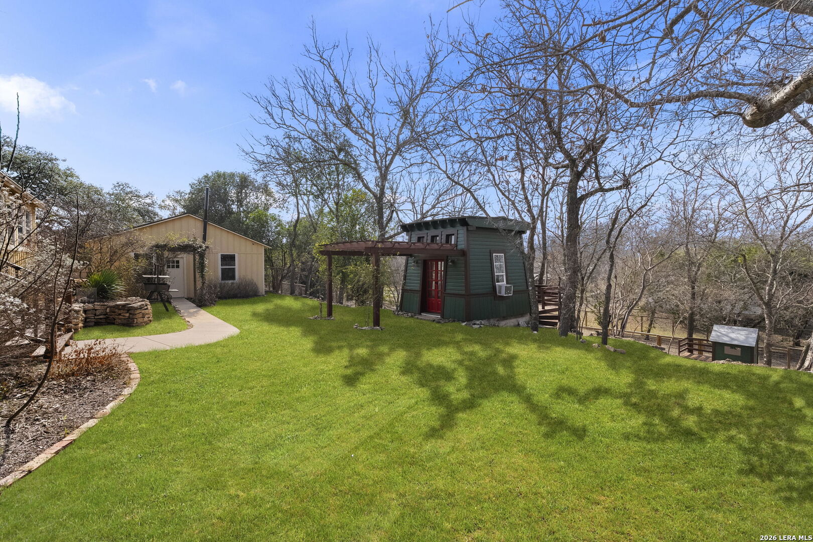107 High Street Comfort, TX 78013 - Photo 41 of 47 a view of a house with a yard