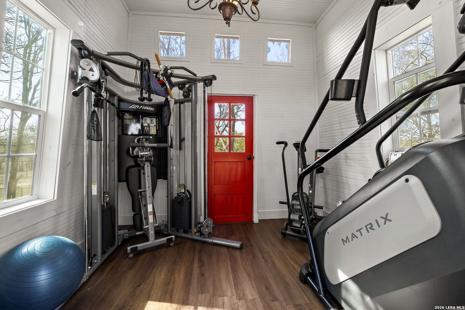 107 High Street Comfort, TX 78013 - Photo 43 of 47 a view of an entryway with wooden floor