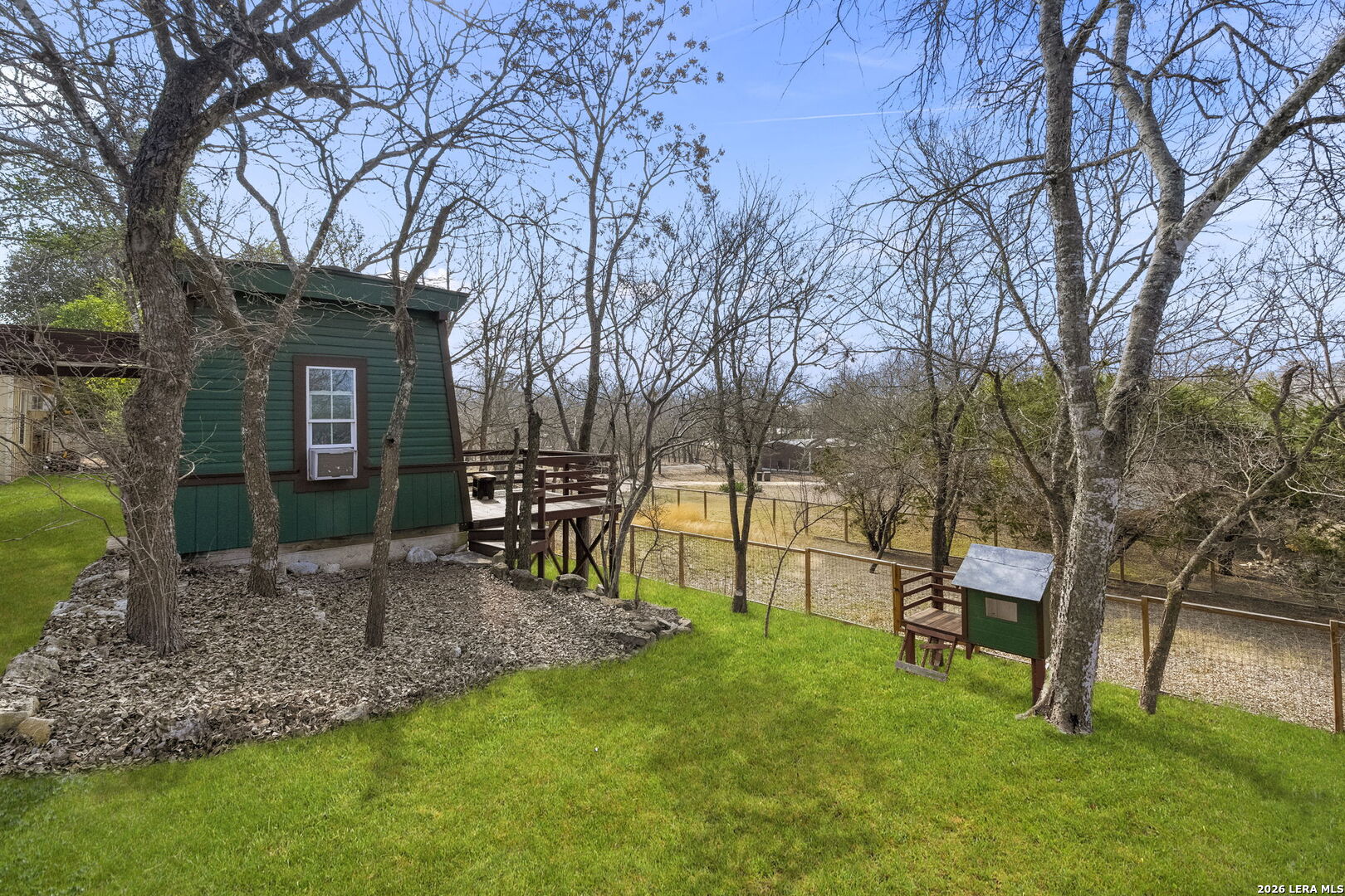 107 High Street Comfort, TX 78013 - Photo 44 of 47 a garden view with a seating space