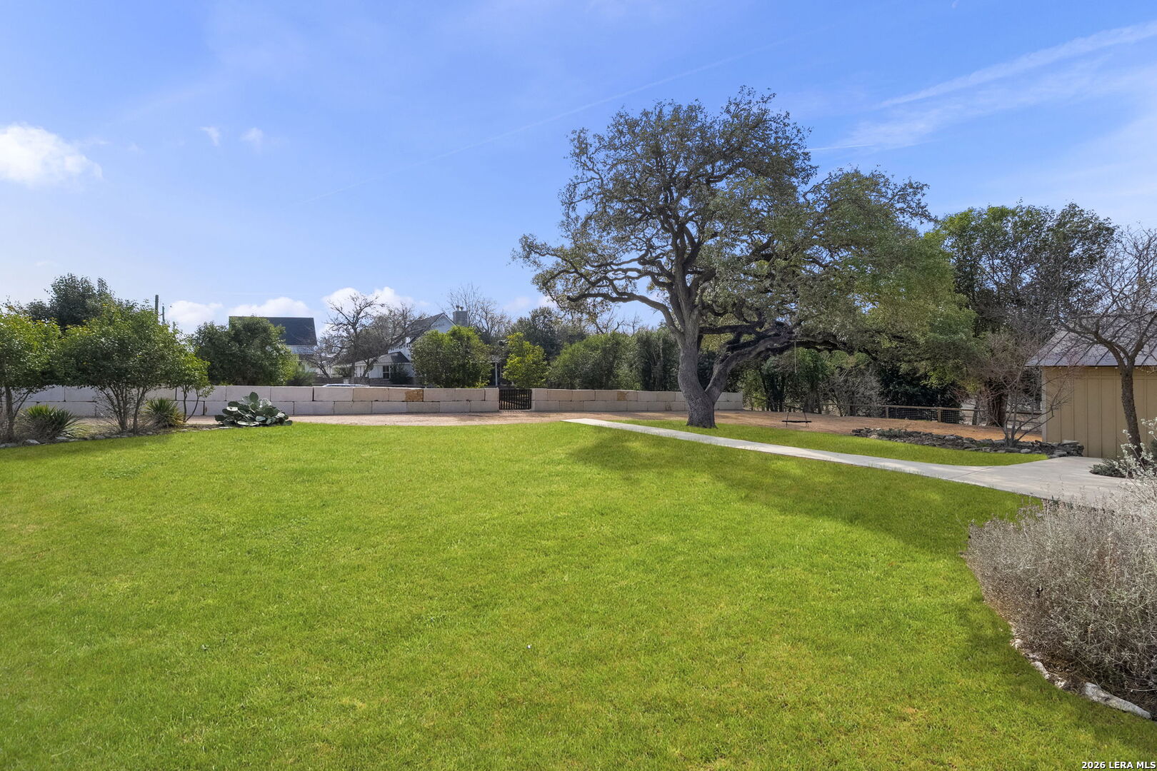 107 High Street Comfort, TX 78013 - Photo 6 of 47 a view of green field with trees in the background