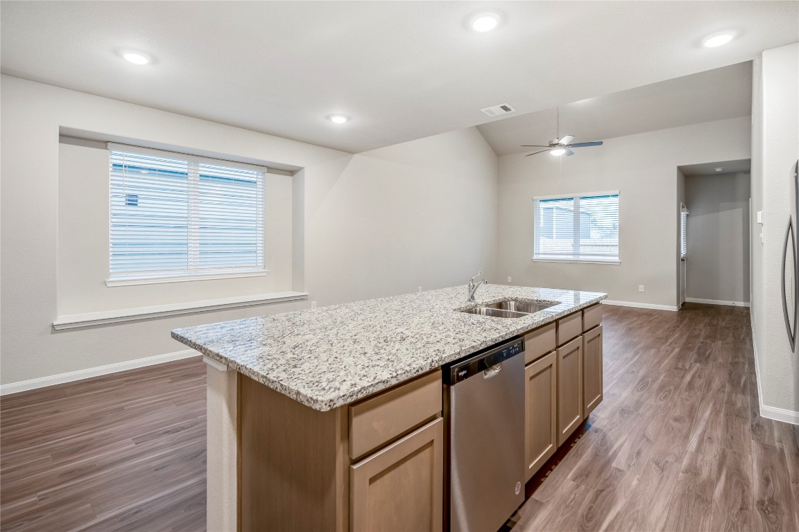 2421 Shellcracker Drive Conroe, TX 77384 - Photo 15 of 43 an empty room with wooden floor and window