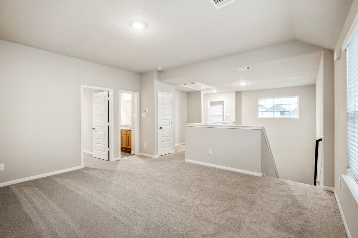 2421 Shellcracker Drive Conroe, TX 77384 - Photo 32 of 43 a view of an empty room with a window