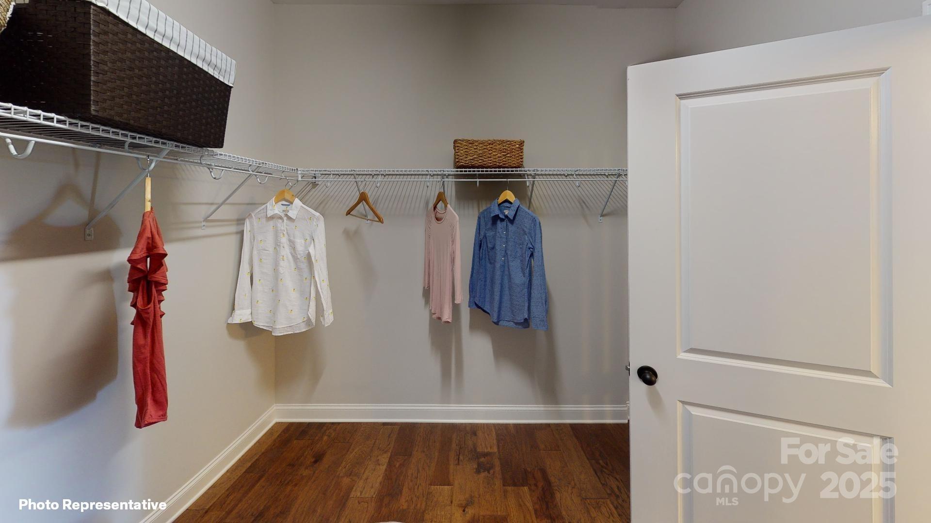 112 Noah Lane Troutman, NC 28166 - Photo 24 of 27 a view of walk in closet with clothes