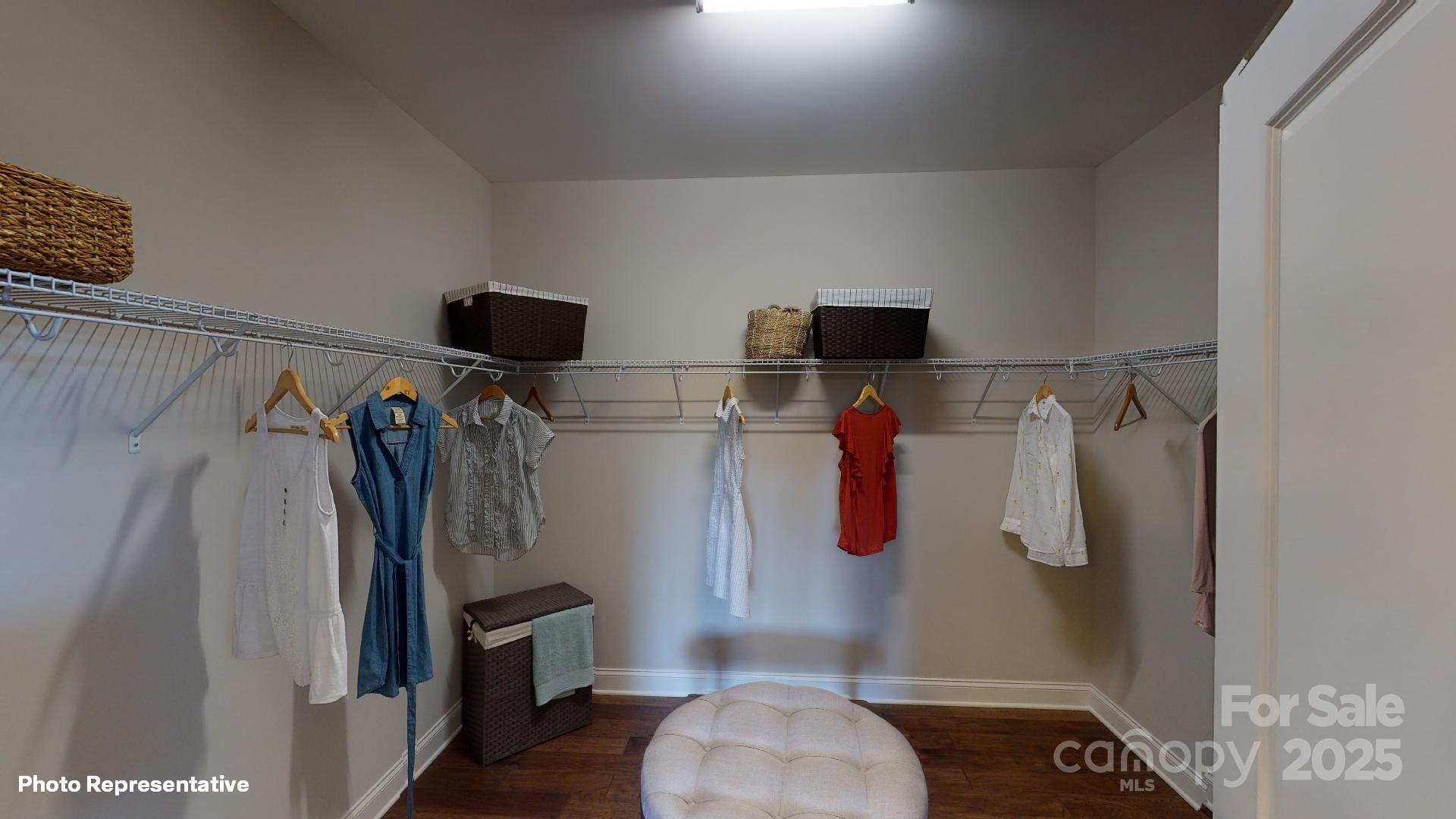 112 Noah Lane Troutman, NC 28166 - Photo 9 of 27 a walk in closet and bathroom in the house