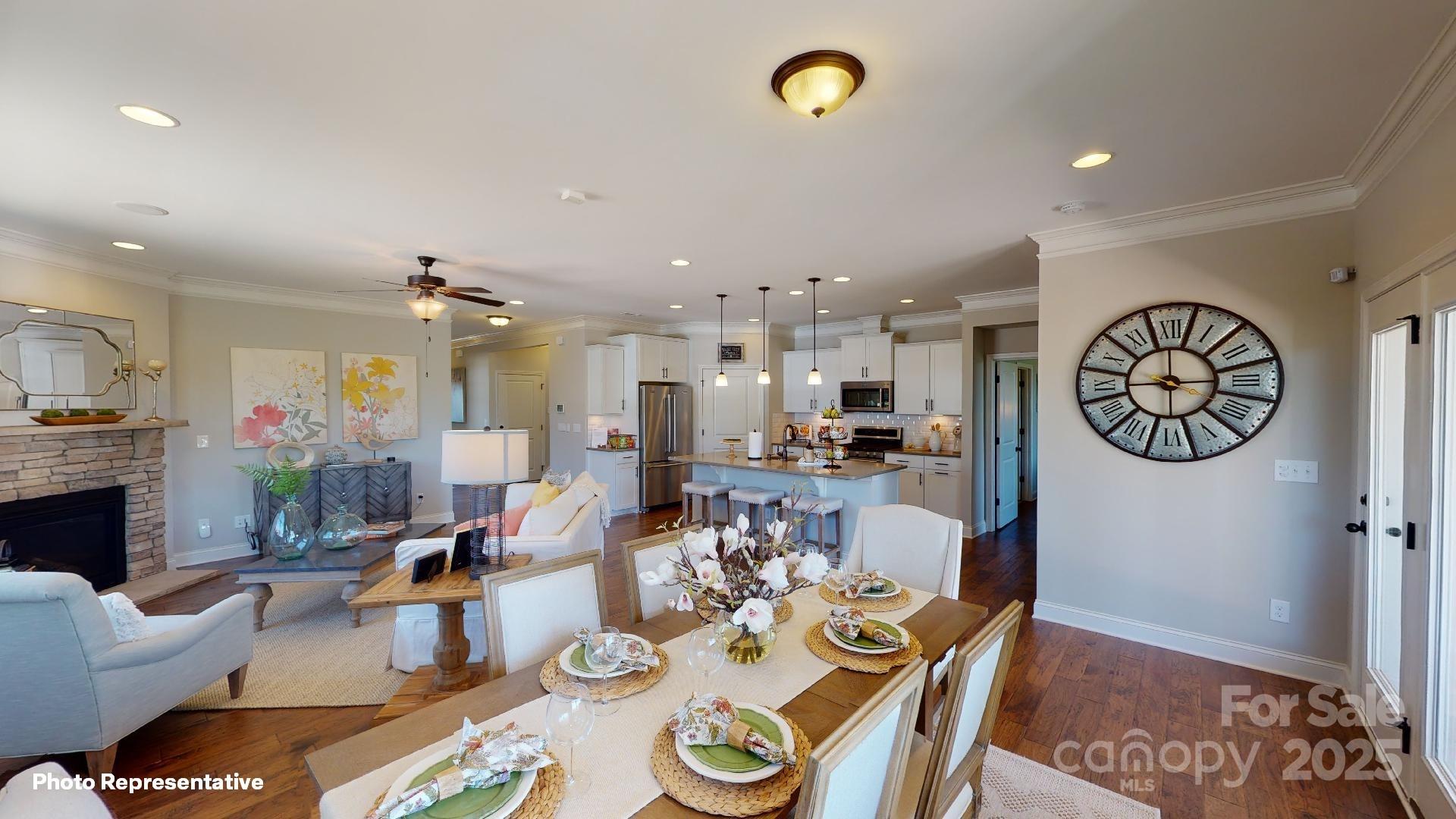112 Noah Lane Troutman, NC 28166 - Photo 10 of 27 a living room with furniture and a table