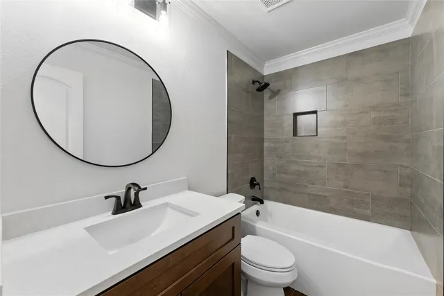 a view of a house with a tree