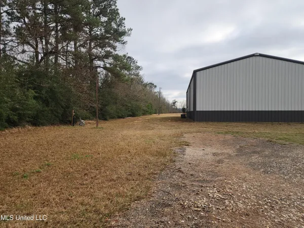 $440,000 | 26 Charlie Daughdrill Road, Carriere, MS 39426