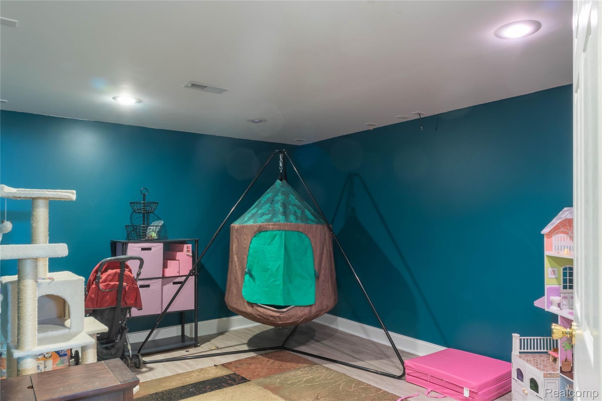 60475 9 Mile Road South Lyon, MI 48178 - Photo 29 of 44 Basement Hangout Area #2