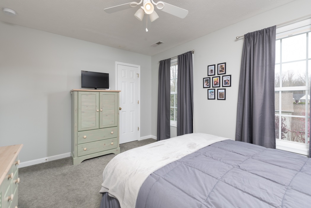 69 Sir Robin Road Waynesboro, VA 22980 - Photo 24 of 32 a bedroom with a bed and a flat screen tv